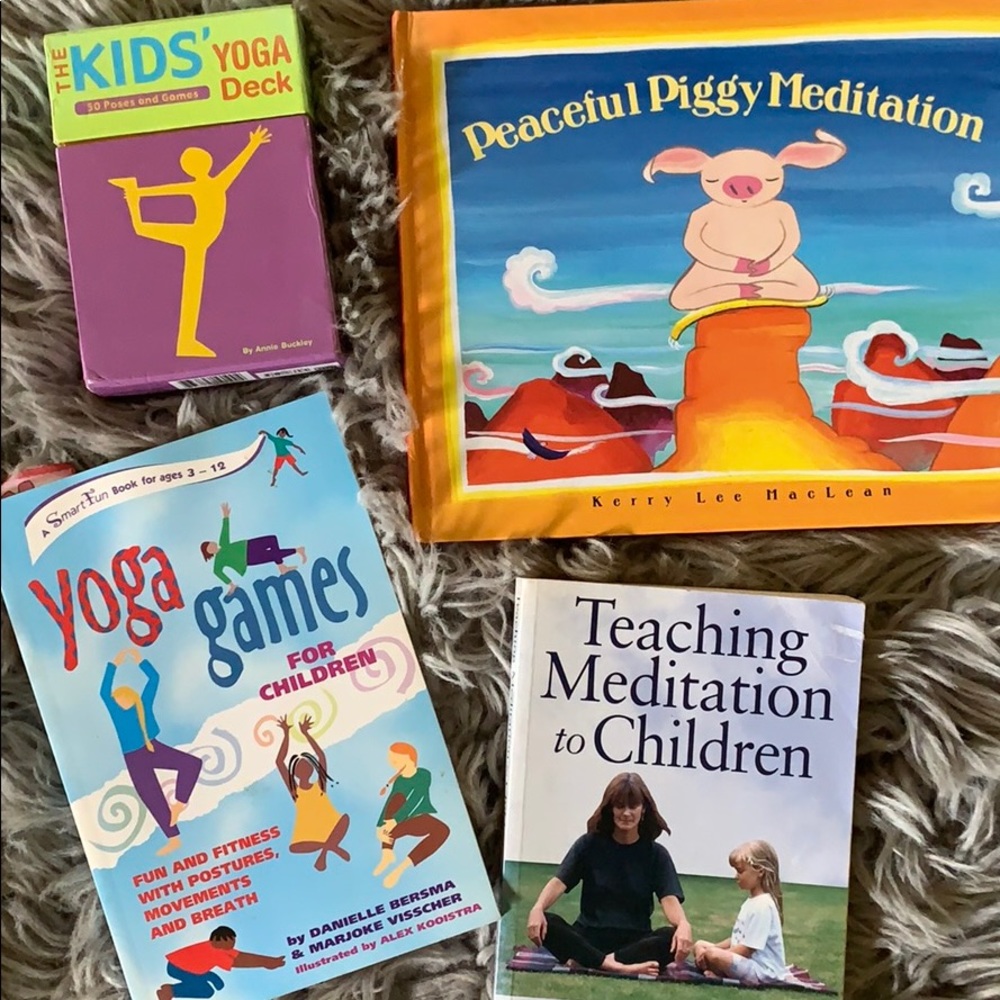 Bundle of books and yoga deck of cards